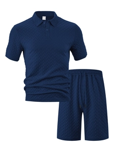 Detailed texture of dark blue polo set with unique herringbone jacquard fabric pattern