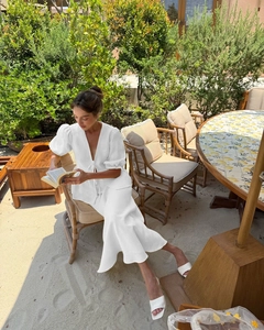 Chic two-piece white linen set with V-neck puff sleeve top and high waist mermaid skirt