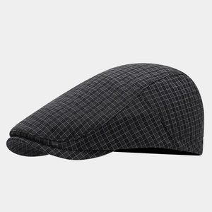 Macro view of British style black checkered ivy cap texture and premium stitching