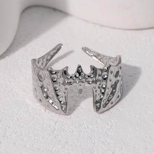 Silver stainless steel bat ring with hammered texture and adjustable open band design