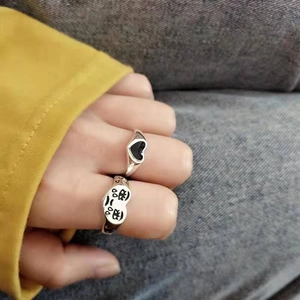 Silver retro open ring set featuring heart and sad face emoji designs on fingers
