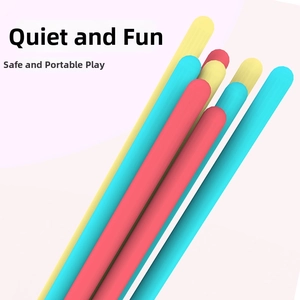 Close-up of bright pink, yellow and teal silicone sensory sticks for kids relief