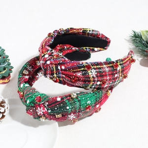 Festive plaid headbands with rhinestones and snowflakes in a Christmas holiday setting