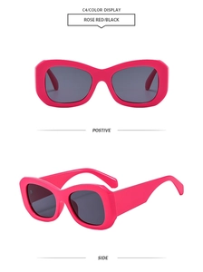 Detail view of square frame Y2K sunglasses with rose red frames and black lenses