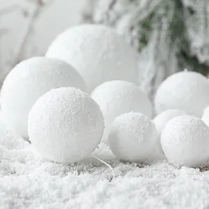 Set of white foam snowballs in various sizes for Christmas tree and winter holiday decor