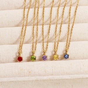 Detail showing five colors of heart zirconia pendants on 18K gold plated stainless chains