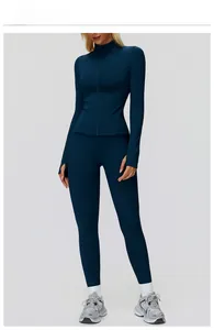 Ensemble de sport bleu canard avec veste zippée à passe-pouces et legging gainant