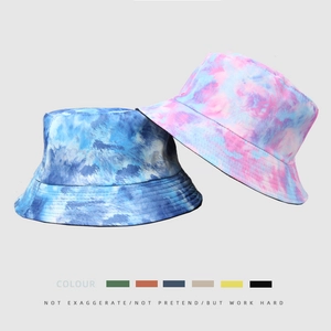 Reversible tie-dye bucket hat for sun protection in blue and pink-purple colorful patterns