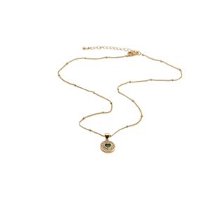 Elegant gold bead chain necklace with green heart zirconia pendant on white background