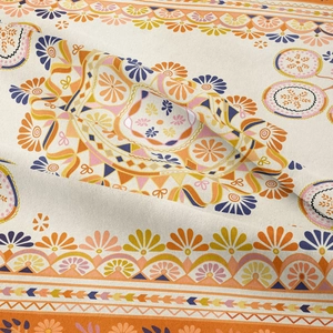 Close-up detail of Bohemian mandala tapestry fabric showing intricate woven texture and patterns