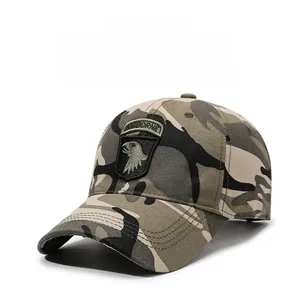 Close-up of Airborne embroidery patch on a woodland camouflage baseball cap
