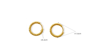 Macro view showing 1.6cm diameter and geometric texture of 18K gold plated hoop earrings