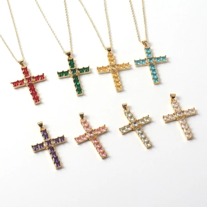 Luxurious gold-plated cross necklaces featuring a colorful array of CZ stones