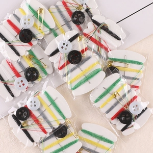 Portable disposable sewing kit with threads needles buttons and safety pins for travel