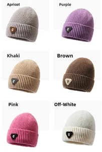 Multi-color collection of ribbed knit beanies featuring elegant leather C letter patches