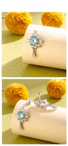Detailed view of titanium steel stud earring with light blue zircon and threaded back