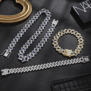 Detailed set of 14mm iced out Cuban link chains and bracelets in silver and gold finishes