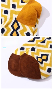 Detail of hand-sewn toe and jacquard diamond pattern on high-density cotton socks
