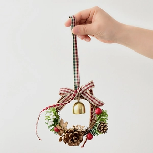 Handheld mini Christmas wreath with pine cones, red berries and gold bells decoration