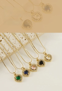 Detailed macro view of heart necklaces featuring five colorful stones with zircon halo