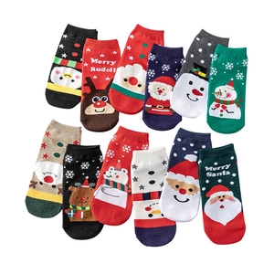 Set of 4 festive Christmas cotton socks featuring cartoon Santa, elk, and snowman patterns