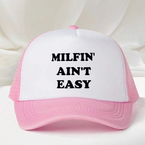Pink and white mesh trucker hat with MILFIN' AIN'T EASY slogan on white front panel