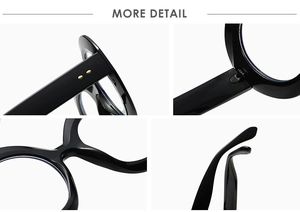 Detail view of glossy black round frames with gold rivets and sturdy metal hinges