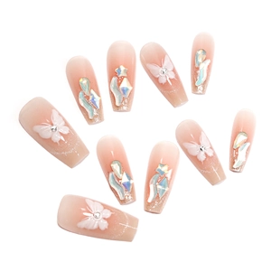 French cat-eye press-on nails with 3D butterflies and aurora rhinestones in nude pink