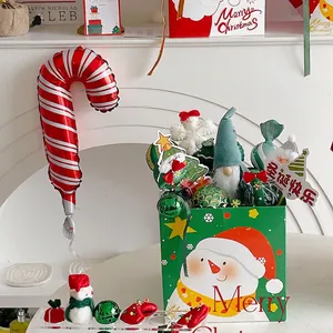 Christmas bouquet gift bag set with plush gnome, snowman box and candy cane balloon