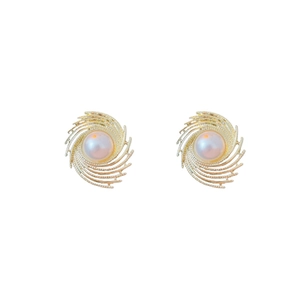 Elegant gold spiral radiating metal earrings with white pearl center for women