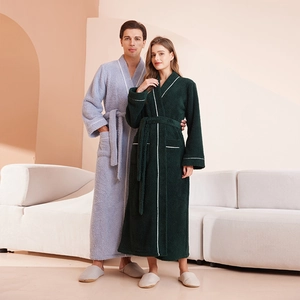 Thick plush winter bathrobes for couples in grey-blue and dark green soft fleece fabric