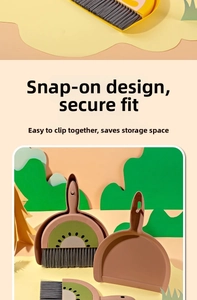 Detail of snap-on mini broom and dustpan set showing space-saving storage design