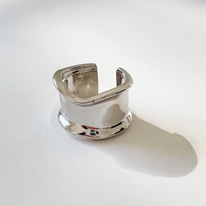 Irregular 925 sterling silver wide ring with a minimalist wavy design and glossy finish