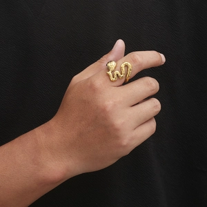 Golden irregular snake ring with scale texture in a punk vintage style for men
