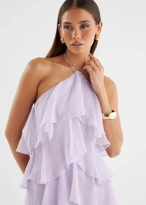 Detailed view of lavender halter neck dress featuring layered tiered ruffle chiffon