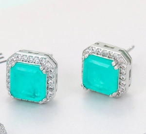 Square cut mint green jewelry set featuring silver earrings with halo diamonds