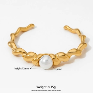 Gold stainless steel wavy open bangle with large pearl accent for women