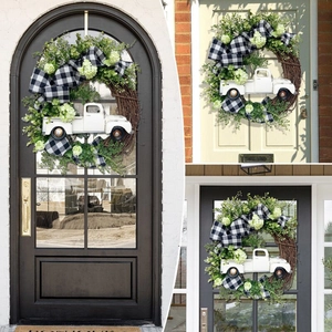Farmhouse Christmas wreath with white hydrangea, plaid bow, and vintage truck on wooden doors
