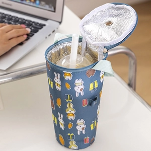Insulated blue cartoon beverage carrier with aluminum lining and green handle