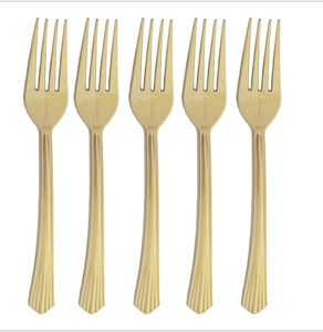 Close-up of premium gold textured forks for party set tableware decorations