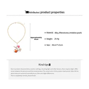 Infographic showing shell and starfish necklace dimensions: 49cm length and 5.5cm pendant size