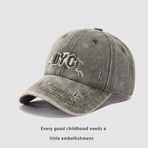 Vintage washed denim baseball cap with DYC embroidery and distressed details for streetwear