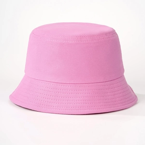 Classic pink cotton bucket hat with parallel stitched brim and minimalist solid color design