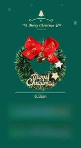 Detailed macro view of 6.3cm mini Christmas wreath with golden bells and red bow ornament