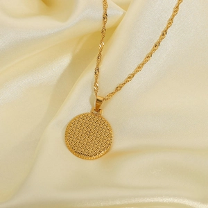 Golden North Star circular pendant necklace on silk fabric, street style fashion jewelry