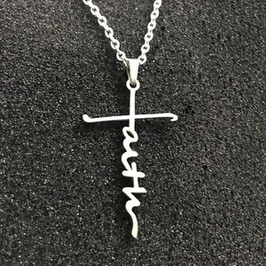 Polished silver stainless steel necklace with a unique vertical Faith cross pendant