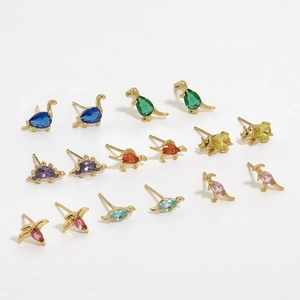 Detailed close-up of colorful cartoon dinosaur earrings with 18K gold plated base