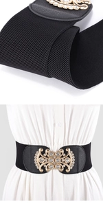 Macro detail of elastic black waist belt with rhinestone buckle on white dress