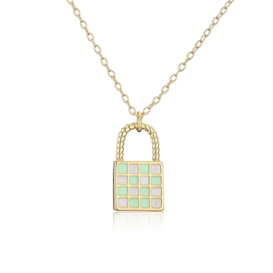 Detailed close-up of gold lock pendant featuring green and white checkered patterns