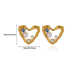 Detailed view of gold heart stud earrings with pearls and blue gem including dimensions